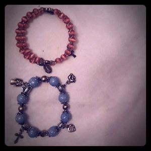 2 bracelets with charms